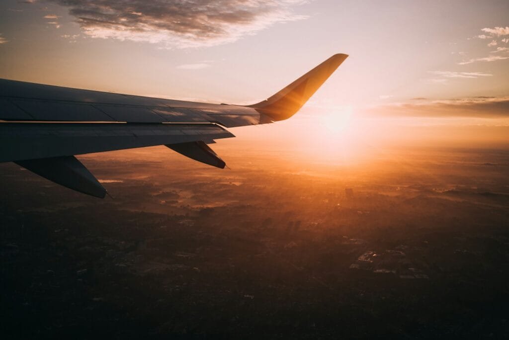 Photo by Nils Nedel airplane on sky during golden hour